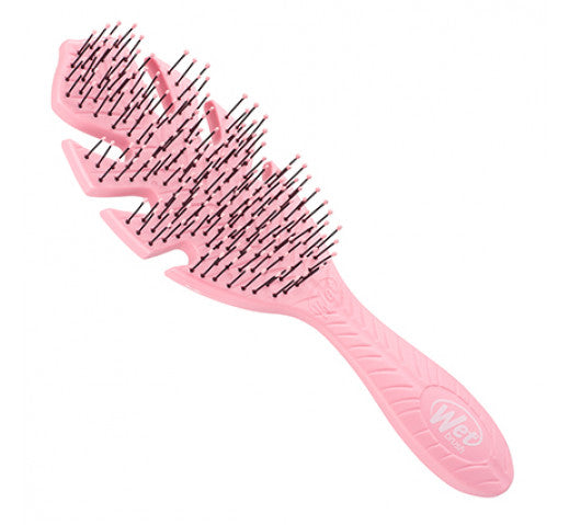 The wet brush go green detangler in the shade pink